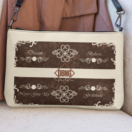 Elegant crossbody bag with elegant batik design and inspirational word Dream, Believe, Never Give Up, Gratitude. Basic color soft cream with brown batik elements. Perfect for unique gift and daily use, both woman and man.